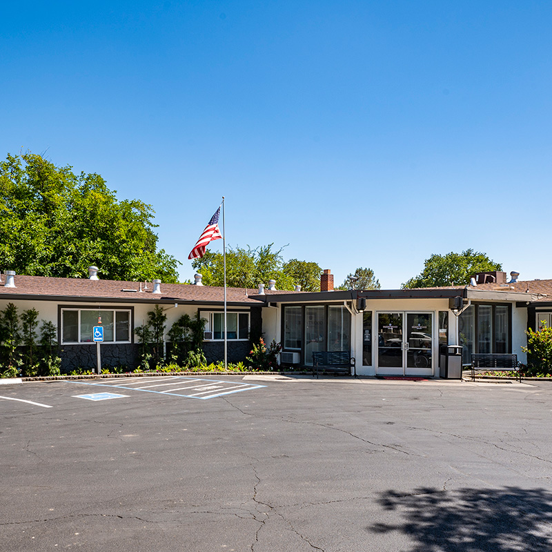 Brentwood Post Acute front garden and parking lot