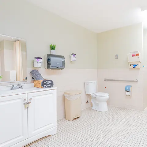 A bright resident bathroom at Sunny Hills