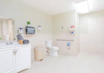 A bright resident bathroom at Sunny Hills