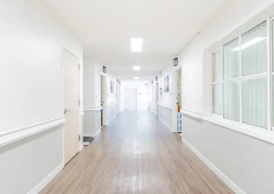 A long hallway with white walls