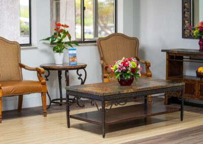 A common area with chairs and a coffee table at Ocean View