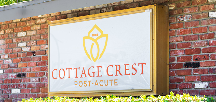 The welcome sign to Cottage Crest