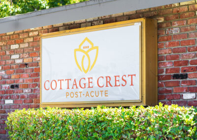 The welcome sign to Cottage Crest