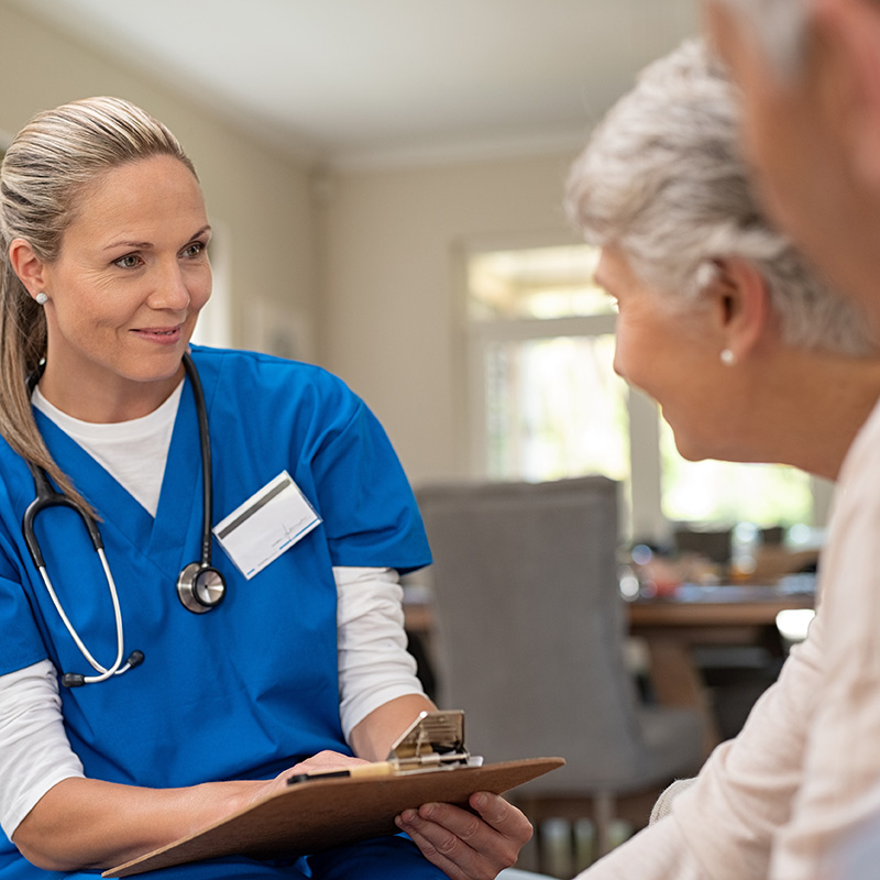Smiling Nurse with a patient