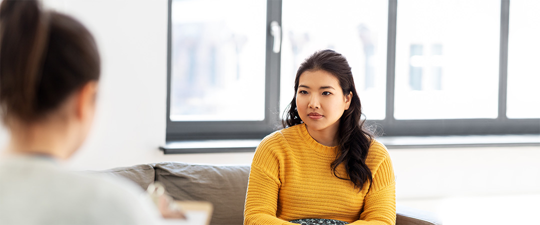 A woman talking to a consultant