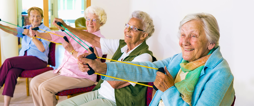 A group of seniors with stretch bands