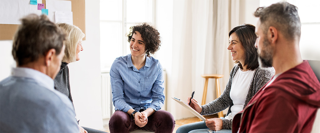 Social services session with a senior and his family